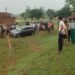 The car fell into a ditch while trying to save the children; the bank cashier had a narrow escape