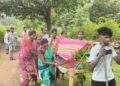 Pregnant Woman Carried on Cot
