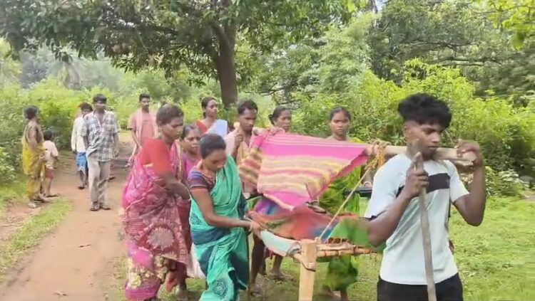 Pregnant Woman Carried on Cot