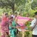 Pregnant Woman Carried on Cot
